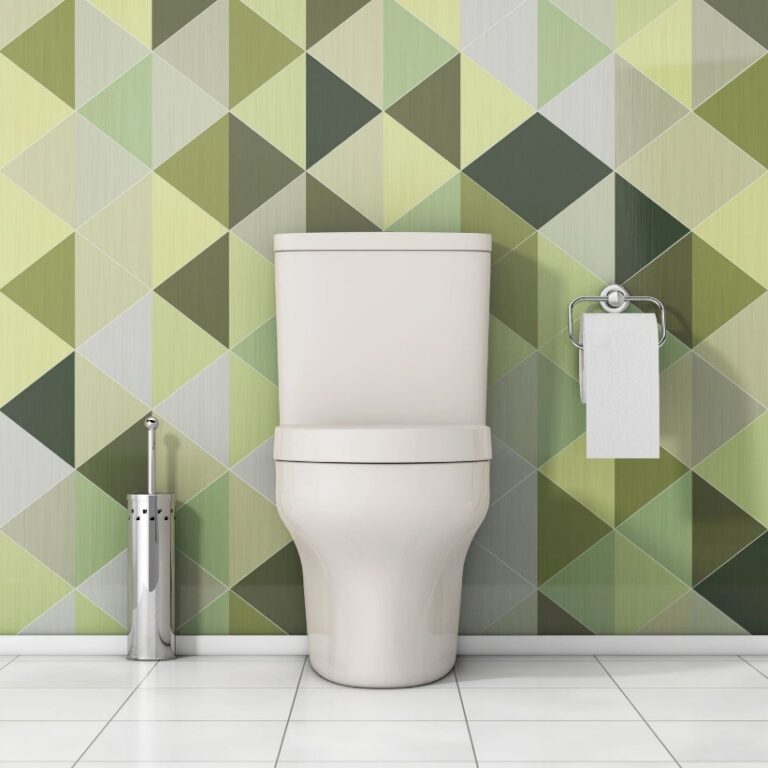 : A white toilet in a bathroom